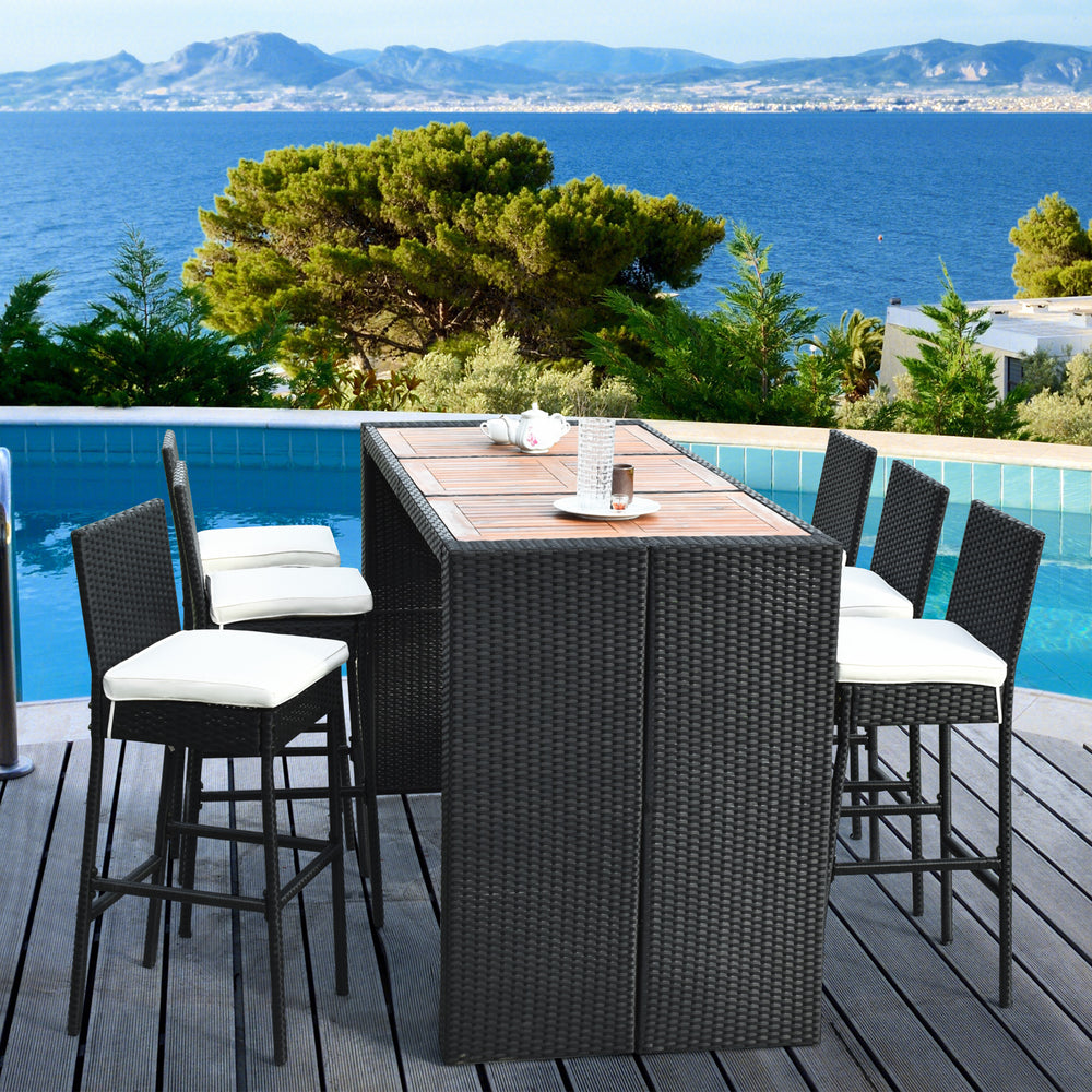 7-piece patio rattan wicker dining set with a table and 6 bar stools, perfect for outdoor gatherings by the pool.