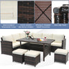 7-piece wicker patio furniture set featuring hand-woven mix brown rattan, thick cushions, and a wide slatted tabletop.