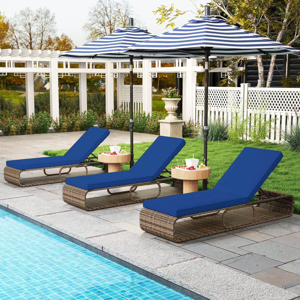 Three navy 7-position adjustable PE rattan chaise lounge chairs by the pool, perfect for sunbathing and relaxation.