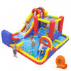 Children enjoy climbing through the colorful inflatable bounce house, featuring a climbing wall and splash pools for outdoor play.