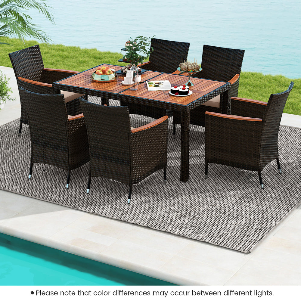 7-piece garden dining patio rattan set with acacia wood table and cushions, perfect for backyard gatherings.