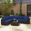 Sectional patio sofa set with navy cushions, made of PE rattan, ideal for outdoor relaxation in garden or backyard.