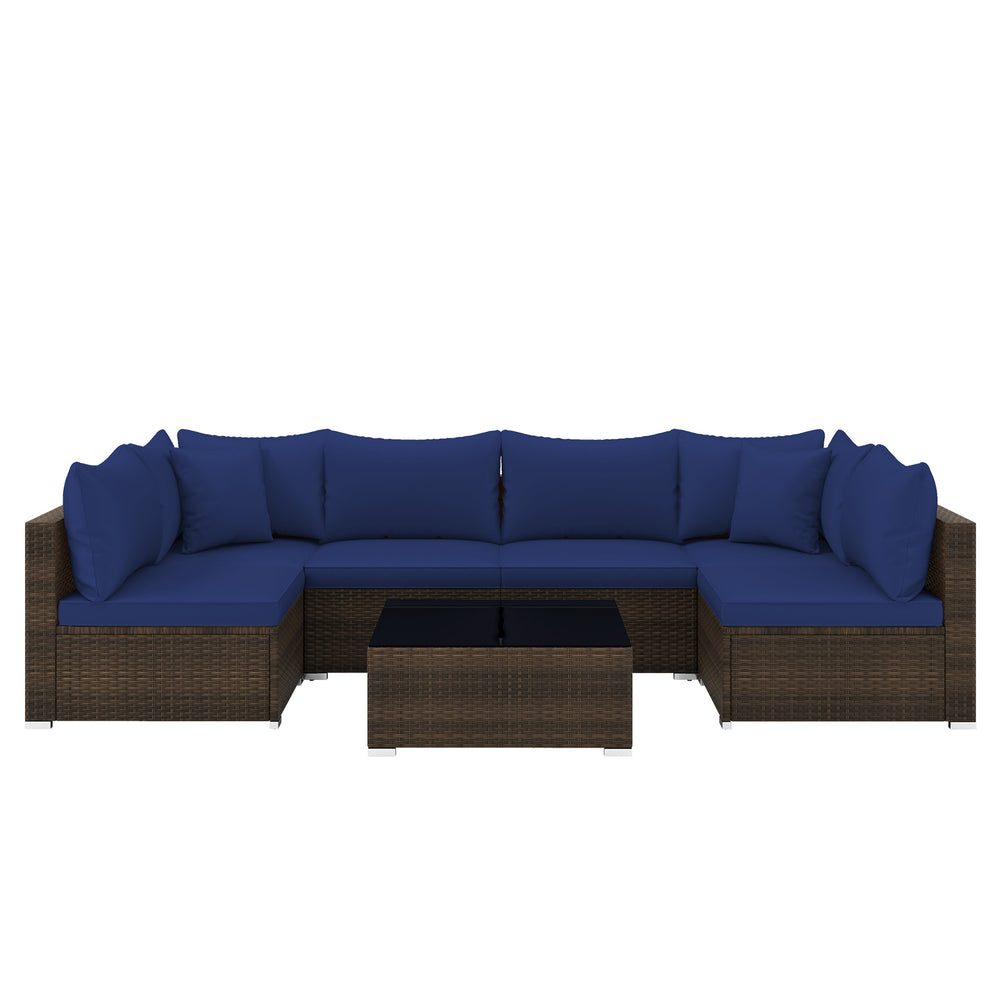 Sectional patio sofa set with navy cushions, PE rattan, and coffee table, perfect for outdoor relaxation.