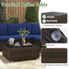 Practical coffee table with tempered glass top and well-woven mix brown PE rattan, ideal for patio or garden use.