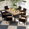7-piece rattan patio dining set with stackable chairs and acacia wood tabletop, perfect for outdoor dining and.