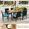 7-piece outdoor dining set featuring an acacia wood table with a reserved umbrella hole and turquoise cushions for.