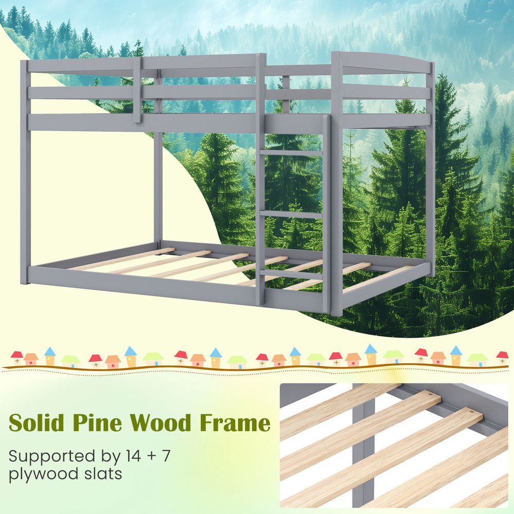 Gray full over full low-to-ground bunk bed with solid pine wood frame and safety guardrails for kids' secure access.