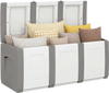 Gray 80-gallon patio container with lockable lid, filled with cushions, designed for outdoor storage and stylish use.