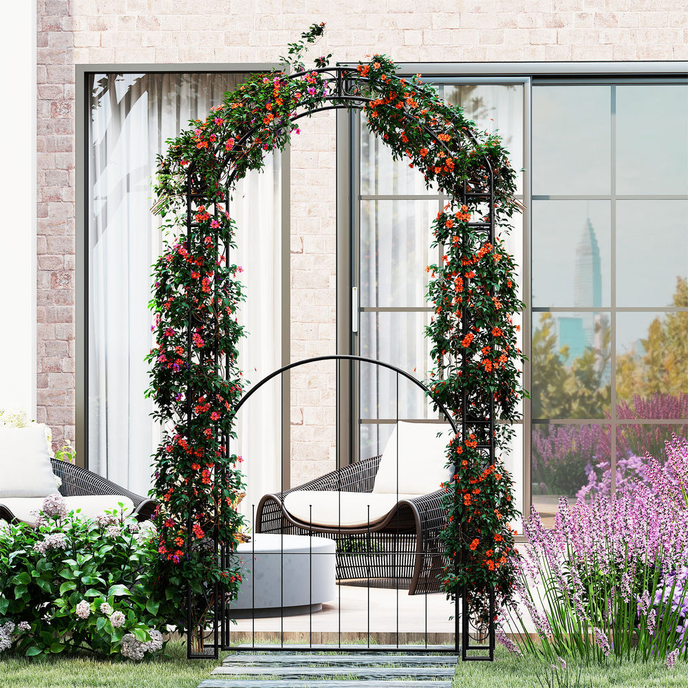 84-inch tall metal garden arch with gate, showcasing an arched design and vibrant flowers, perfect for enhancing.