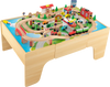 Wooden train and activity table with reversible top, featuring 84 pieces for imaginative play and learning in a.