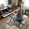 88-key electric piano keyboard with adjustable stand, portable bag, and sensitive touch response for music practice.