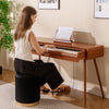 88-key electric piano in brown with push-pull drawer, ideal for music practice or as a stylish writing desk.