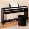 88-key weighted keyboard with furniture stand in black, featuring a removable music stand and triple piano pedals.