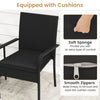 Black patio chair with soft cushion and zippered cover, crafted from durable PE rattan for outdoor comfort.