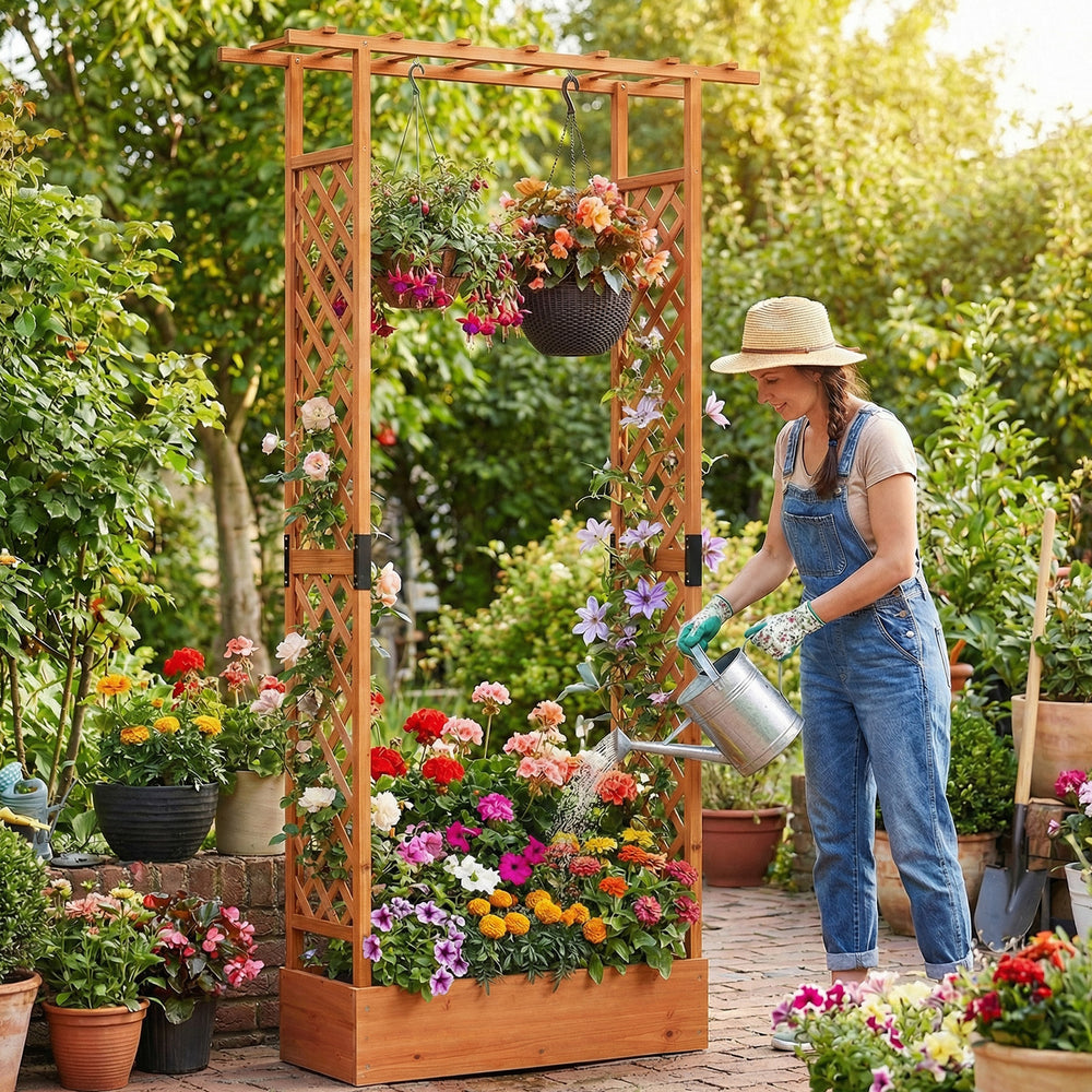 Wooden raised garden bed with trellis, supporting vibrant flowers and plants, ideal for patios and balconies.