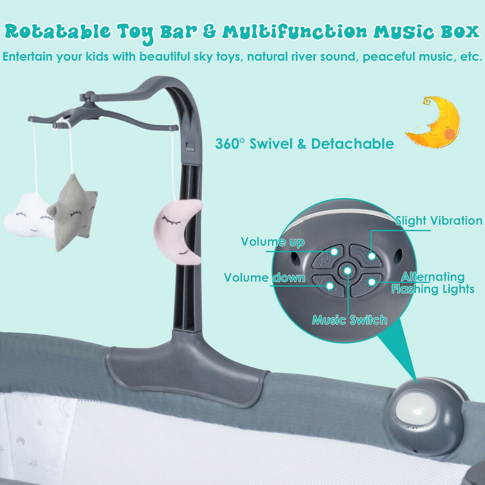 Height adjustable baby side crib in dark gray with a detachable toy bar and multifunction music box for nighttime care.