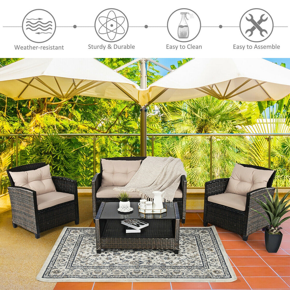 4-piece outdoor rattan furniture set featuring 2 single sofas, a loveseat, and a glass table, perfect for backyard.