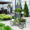 6-tier garden cart flower rack in black, showcasing potted plants, perfect for outdoor patio or indoor decor.