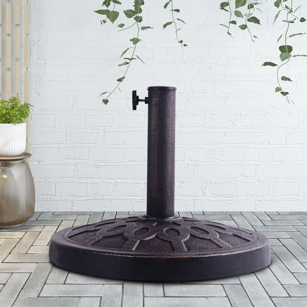 Heavy-duty 30lbs patio umbrella base with decorative bronze finish, designed for stability and rust resistance.