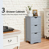 Freestanding gray 3-drawer cabinet with cut-out handles, perfect for compact bathroom storage and elegant home decor.