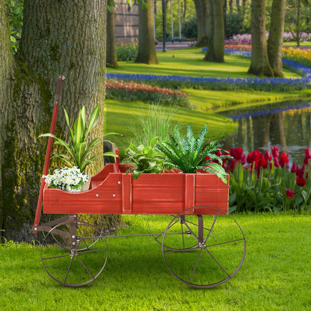 Wooden wagon plant bed in red with two planting sections and metal wheels, perfect for garden or patio decoration.