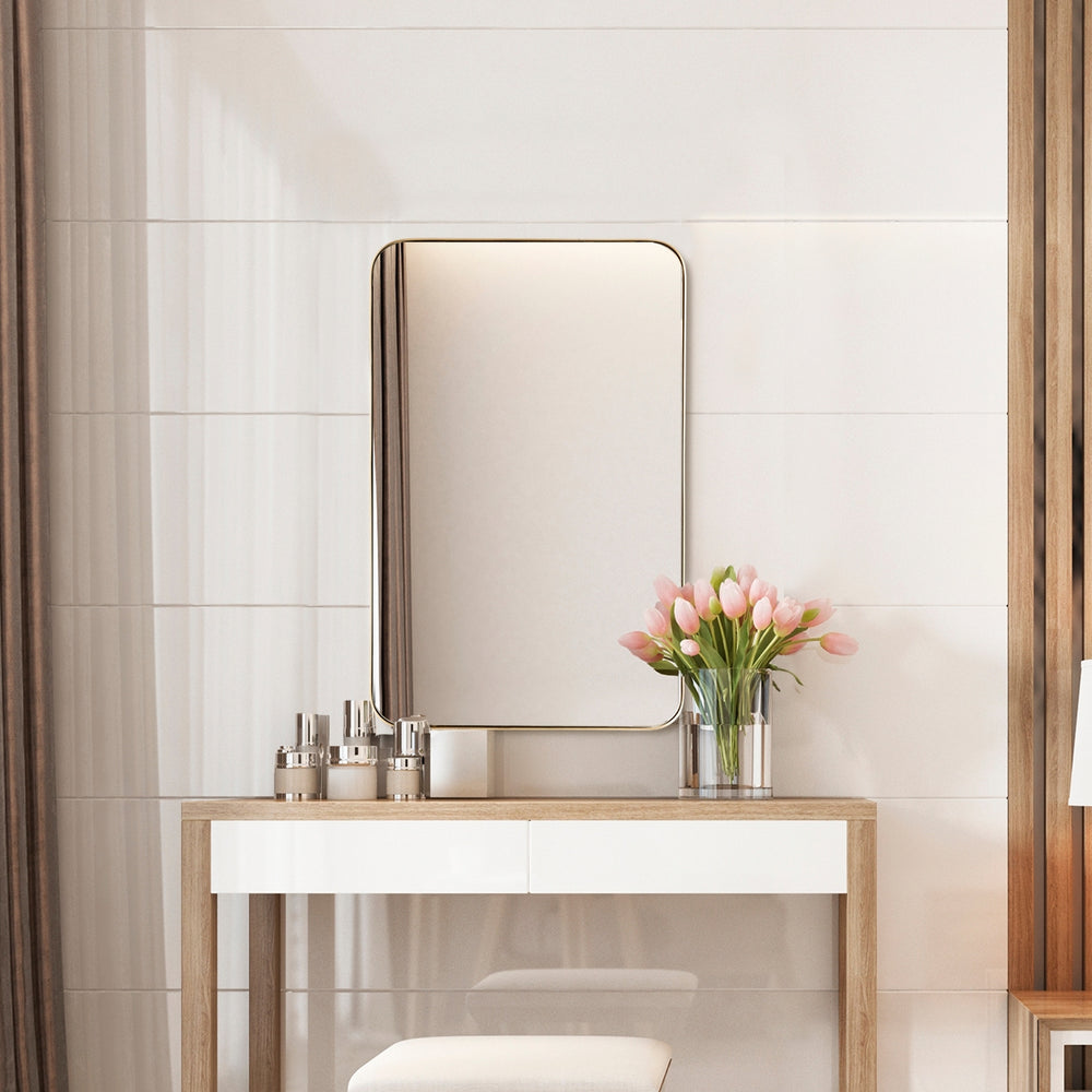 Rectangular 32x20 inch wall-mounted mirror with a golden metal frame, perfect for bathrooms or living rooms.