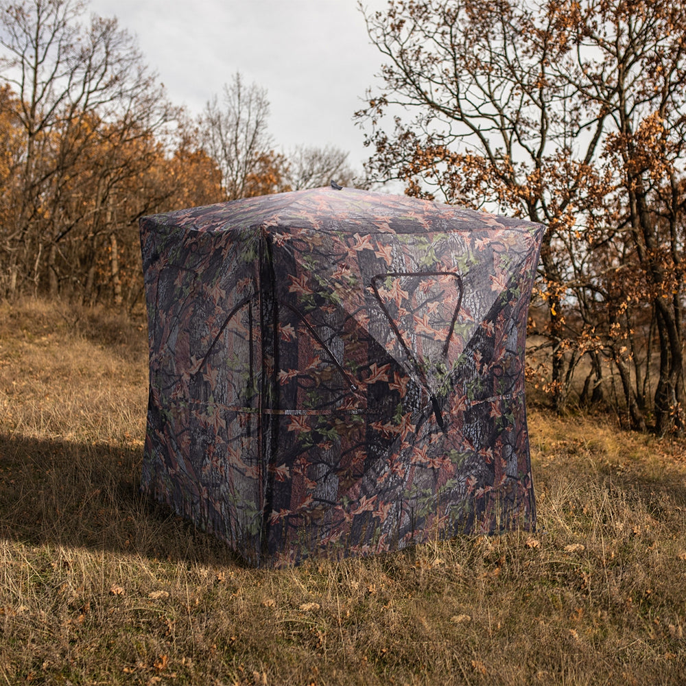 Portable deer hunting blind in camo design with six full view windows for 360° visibility, ideal for stealthy hunting.