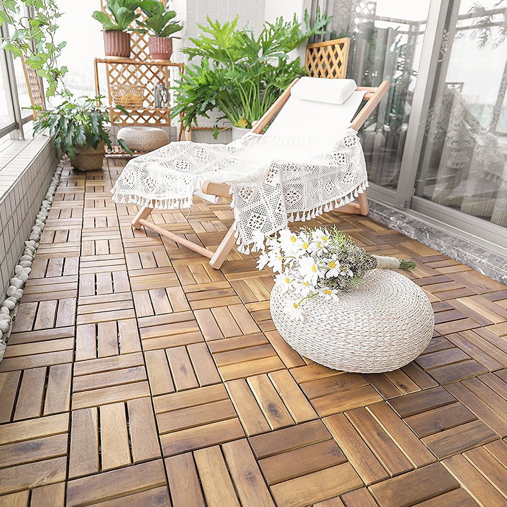 Acacia wood interlocking tile flooring displayed on a balcony, showcasing a rustic style and durable design for outdoor.
