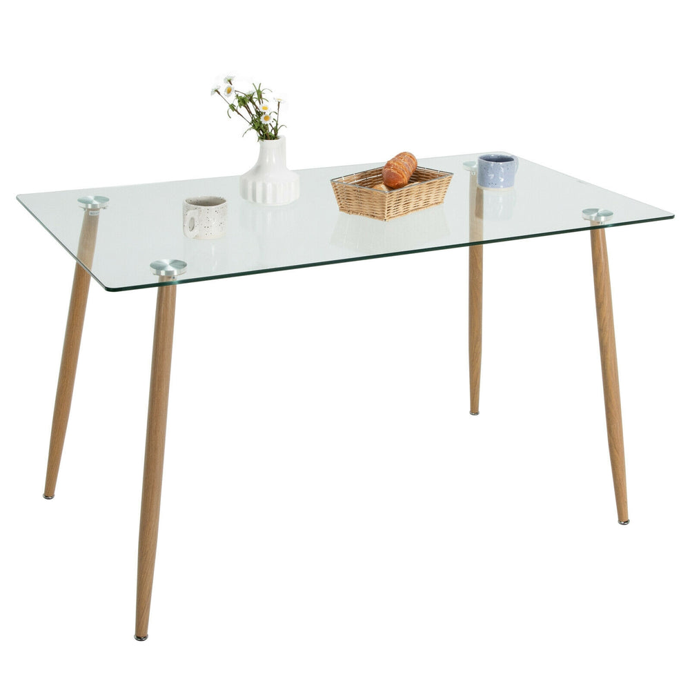 Rectangular glass dining table with wood grain imitation legs, ideal for home or office, featuring a clear tabletop.