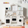 Wooden kids kitchen playset featuring a washing machine, oven, and microwave, designed for imaginative play and.