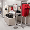 Sign holder stand with 360° rotation, adjustable height, and a heavy-duty base for displaying 8.5 x 11 inch signs.