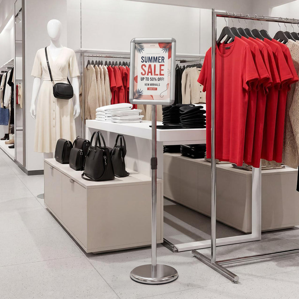 Sign holder stand with 360° rotation, adjustable height, and a heavy-duty base for displaying 8.5 x 11 inch signs.