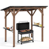 Cedar wood BBQ gazebo features a spacious design with a sloped metal roof, perfect for outdoor cooking and entertainment.