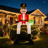8.7 ft inflatable Christmas nutcracker decoration seated on a bush, featuring bright LED lights for a cheerful holiday atmosphere.