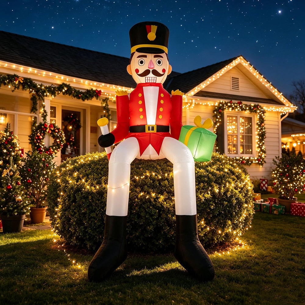 8.7 ft inflatable Christmas nutcracker decoration seated on a bush, featuring bright LED lights for a cheerful holiday atmosphere.