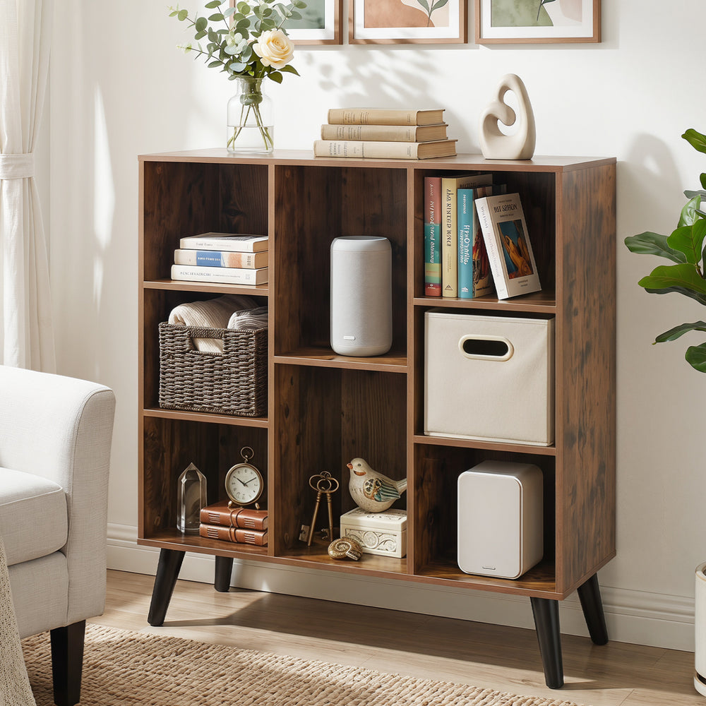Rustic brown 8-cube bookcase with raised support legs, featuring eight storage compartments for versatile organization.