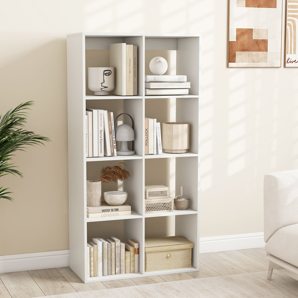 8-cube bookshelf in white displaying organized books and decor, designed for versatile storage in living room or.