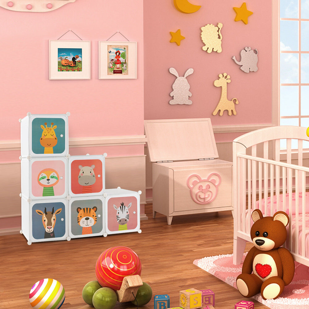 Colorful 8 cube kids wardrobe closet with cartoon doors, perfect for organizing toys and clothes in a child's room.