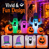 Three cute ghosts with hats and four pumpkins illuminated by RGB LED lights for a festive Halloween display.