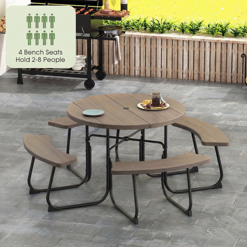 Round rustic brown picnic table set with four benches, seats 2-8 people, ideal for outdoor gatherings.