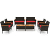 8-piece patio wicker sofa set featuring 4 rattan chairs and 2 loveseats with red cushions and acacia wood accents.