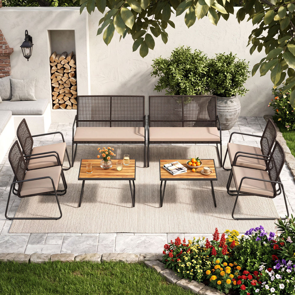 Eight-piece patio furniture set featuring acacia wood coffee table and zippered cushions, perfect for outdoor relaxation.