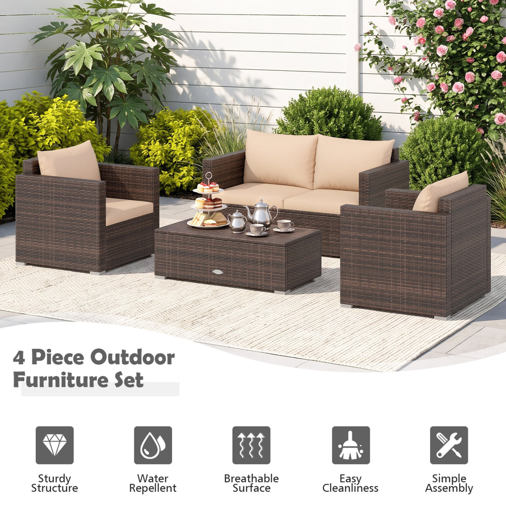 Four-piece outdoor furniture set featuring weather-resistant PE rattan, padded cushions, and a coffee table for relaxation.