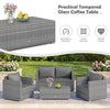 Gray patio rattan coffee table with tempered glass surface, designed for outdoor use and easy cleaning.