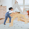 Child climbing on the 8-in-1 natural beech wood sensory table with collapsible storage bin for kids aged 3+.