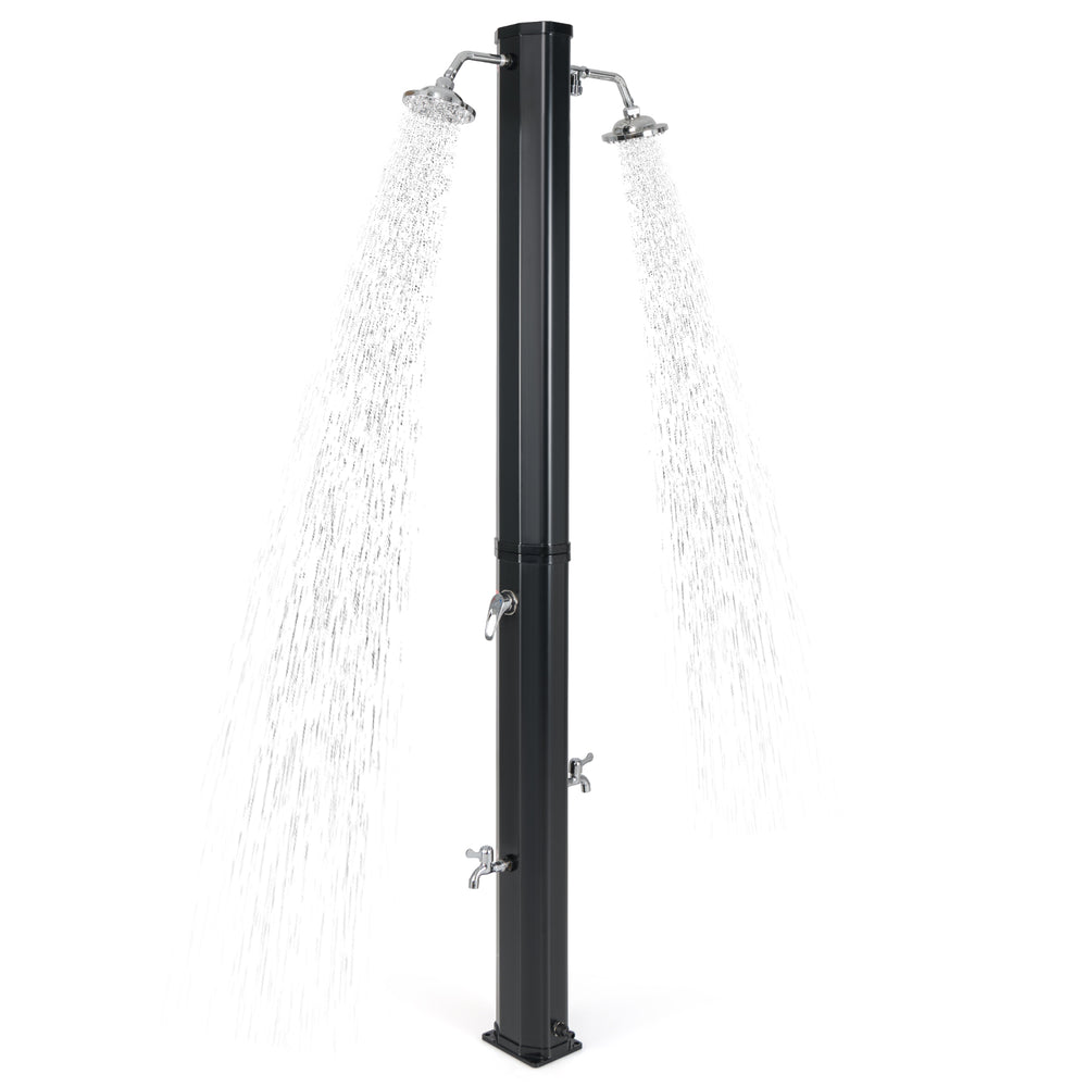 Dual shower heads on a black solar heated outdoor shower, perfect for poolside or beach use with adjustable water flow.