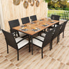 Rectangular patio dining table made of acacia wood with slatted design, surrounded by 8 rattan chairs with cushions for.