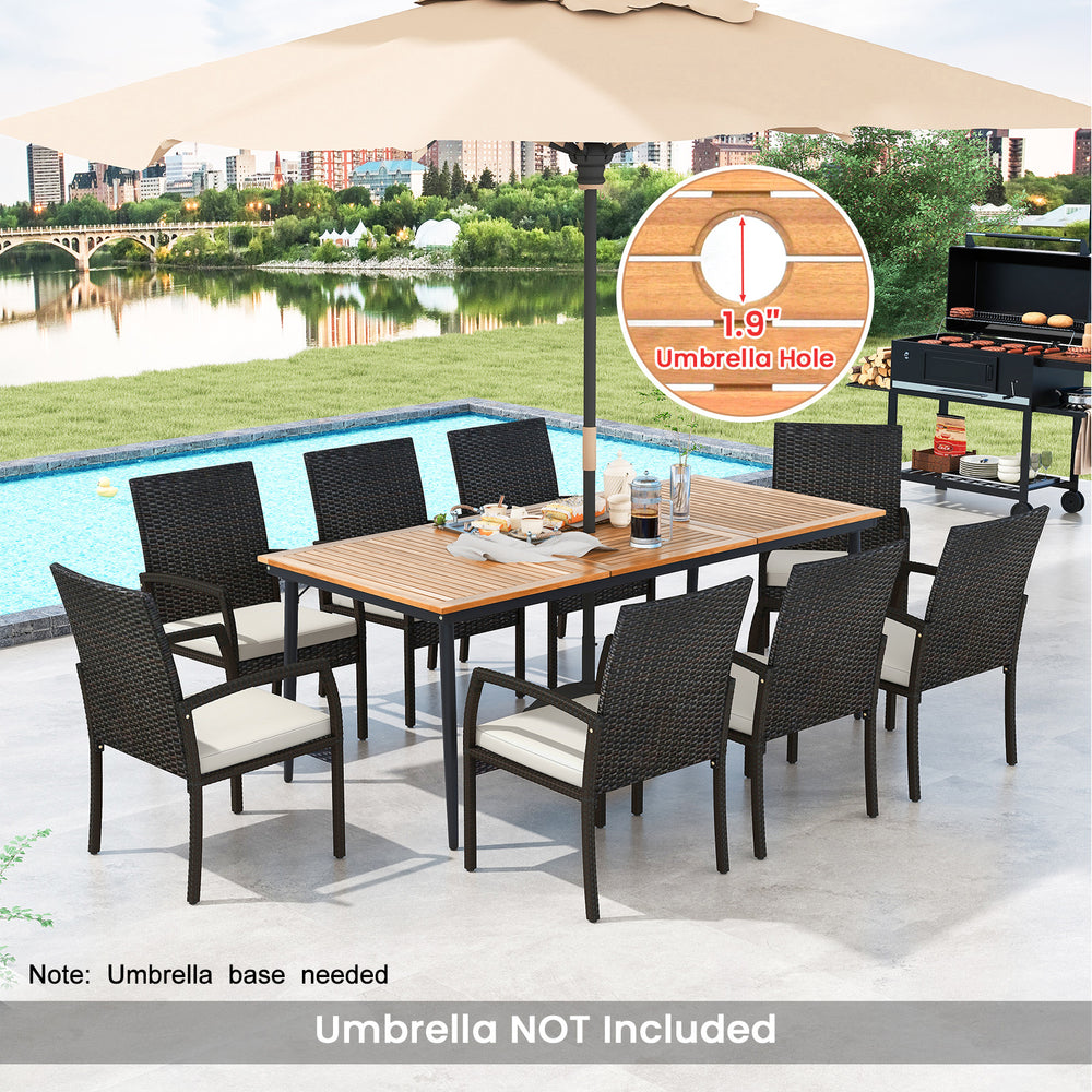 9-piece patio dining set featuring an acacia wood tabletop, 8 rattan chairs with cushions, and a 1.9" umbrella hole.