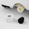 Close-up of the drainage components of the 3-in-1 9000 BTU air conditioner, featuring a white cap and black plug.