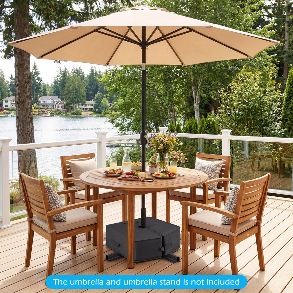 Black 90 lbs sand-fillable umbrella base with adjustable strap, designed for stability and easy relocation.